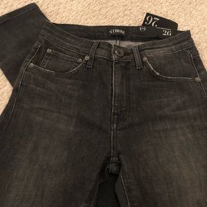 Storm High Rise Skinny Faded Black Jeans